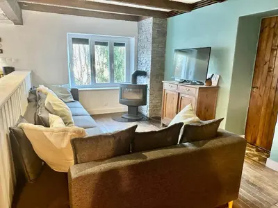 Coin salon dans l'établissement Le Gîte de Hildegarde