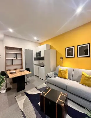 Cuisine ou kitchenette dans l'établissement Mulhouse Gare Studio Wifi