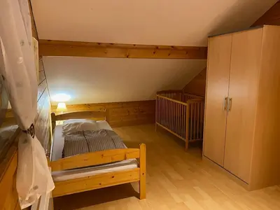 Un ou plusieurs lits dans un hébergement de l'établissement Chalet tout confort 1-7 personnes