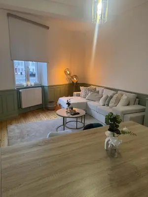 Coin salon dans l'établissement Le Logis du Munstertal à 20 minutes de Colmar