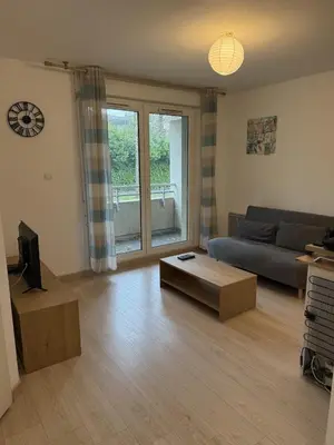 Coin salon dans l'établissement Appartement calme et lumineux