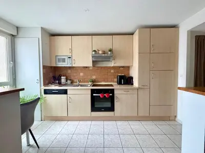 Cuisine ou kitchenette dans l'établissement Serene Apartment by the Basel Border