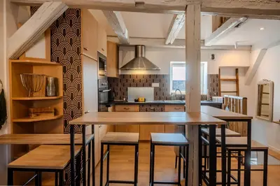 Cuisine ou kitchenette dans l'établissement L'Envol - Centre Ville - Proche Parking Gratuit - Commerces à Proximité