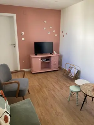 Télévision ou salle de divertissement dans l'établissement Maison individuelle Le Pigeonnier