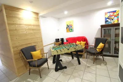 Coin salon dans l'établissement Gîte La Louvière La Bresse sauna nature centre à