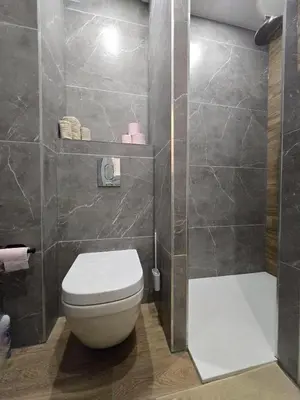 Salle de bains dans l'établissement Moon avec Jardin - Centre - Gare