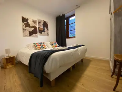 Un ou plusieurs lits dans un hébergement de l'établissement Apartment Bugatti in Riquewihr by Interhome