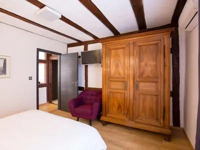 Un ou plusieurs lits dans un hébergement de l'établissement Apartment Bartholdi in Reichenweier by Interhome