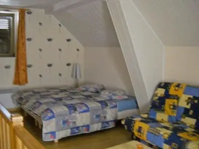 Un ou plusieurs lits dans un hébergement de l'établissement Apartment Wohnung am Rheinufer in Kunheim by Interhome