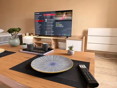 Télévision ou salle de divertissement dans l'établissement Titi90