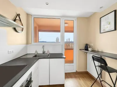 Cuisine ou kitchenette dans l'établissement T2 confortable proche commerces & Bâle