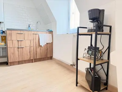 Cuisine ou kitchenette dans l'établissement Cozy Apartment city center