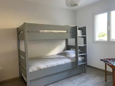 Un ou plusieurs lits dans un hébergement de l'établissement Appartement avec jardin privatif Gérardmer
