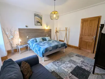 Un ou plusieurs lits dans un hébergement de l'établissement Chambres Eugène et Gabrielle, La Villa de Fraize