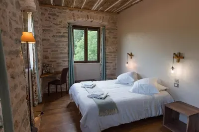 Un ou plusieurs lits dans un hébergement de l'établissement Hôtel le Morimont