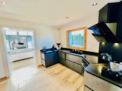 Cuisine ou kitchenette dans l'établissement La lisière romantique