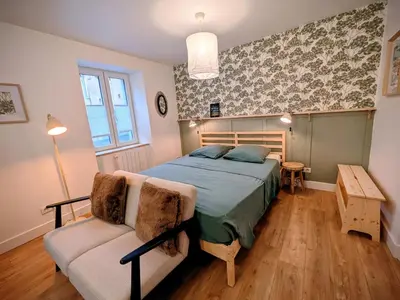 Un ou plusieurs lits dans un hébergement de l'établissement Le studio du rempart, appartement cosy au coeur de village