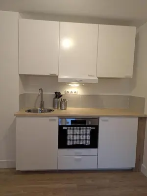 Cuisine ou kitchenette dans l'établissement Le studio du rempart, appartement cosy au coeur de village