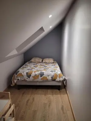 Un ou plusieurs lits dans un hébergement de l'établissement Location 12 personnes SPA pêche chez Mémère Hélène