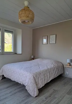 Un ou plusieurs lits dans un hébergement de l'établissement Location 12 personnes SPA pêche chez Mémère Hélène