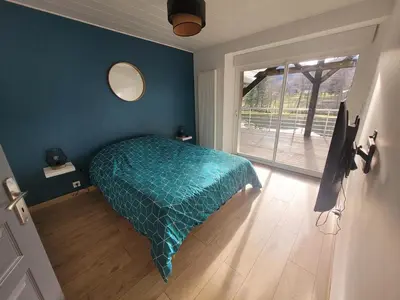 Un ou plusieurs lits dans un hébergement de l'établissement Location 12 personnes SPA pêche chez Mémère Hélène
