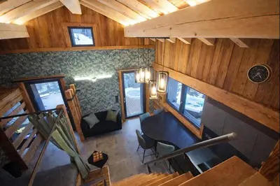 Coin salon dans l'établissement Le Hangar des Ô Evasion nature et Spa