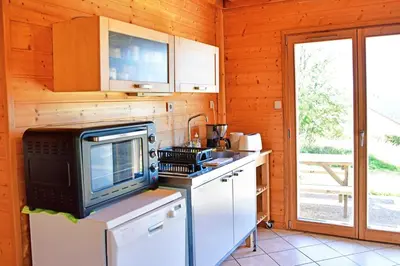 Cuisine ou kitchenette dans l'établissement Terrasse des Sorbiers