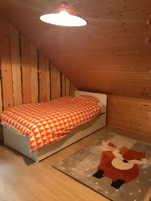 Un ou plusieurs lits dans un hébergement de l'établissement Cozy chalet in the Vosges with scenic views