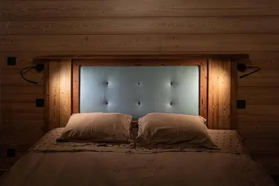 Un ou plusieurs lits dans un hébergement de l'établissement Fleur des Vosges Chalet, panorama of La Bresse