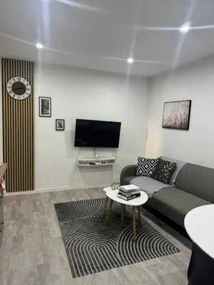 Télévision ou salle de divertissement dans l'établissement Appart' Cosy proche Mulhouse