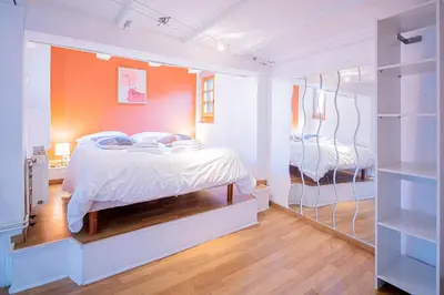 Un ou plusieurs lits dans un hébergement de l'établissement Loft Cocon d'Alsace - Cour intérieure au calme