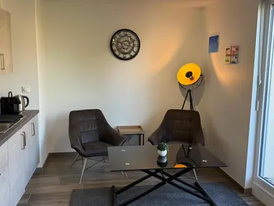 Coin salon dans l'établissement Le Petit Maraîcher
