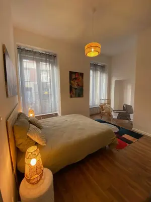 Un ou plusieurs lits dans un hébergement de l'établissement Bright and spacious apartment, Belfort center