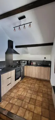 Cuisine ou kitchenette dans l'établissement Gîte des sources