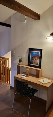 Télévision ou salle de divertissement dans l'établissement Gîte des sources