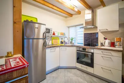 Cuisine ou kitchenette dans l'établissement Au nid d'Alsace - SPA et sauna privé