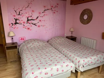Un ou plusieurs lits dans un hébergement de l'établissement Gîte la Chenevière
