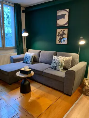 Coin salon dans l'établissement Appartements des 2 Têtes
