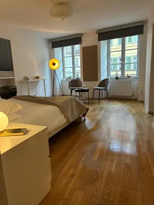 Coin salon dans l'établissement Appartements des 2 Têtes