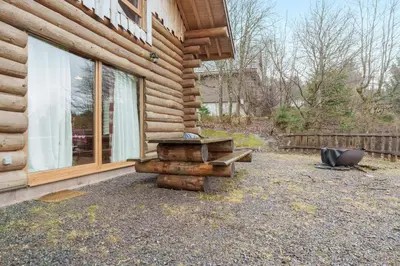 Jardin de l'établissement Les Rondins du bois d'Eden - Chalet 8p