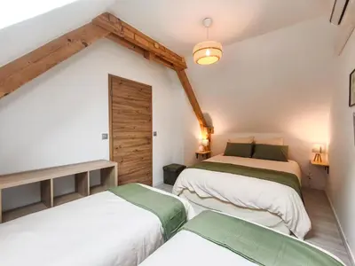 Un ou plusieurs lits dans un hébergement de l'établissement Parenthèse détente en Alsace - Terrasse & Parking