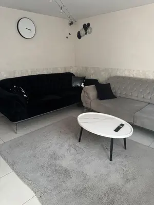 Coin salon dans l'établissement Lila's Home - Appartement dans maison avec extérieur