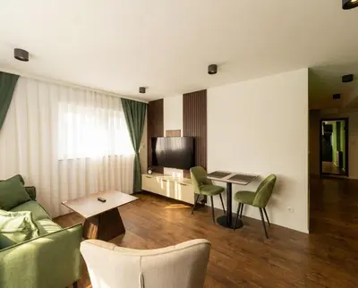 Coin salon dans l'établissement Le Premium-Prestige Residence Euroairport