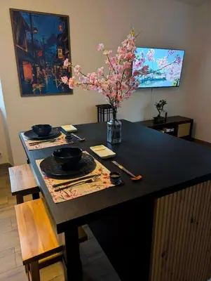 Télévision ou salle de divertissement dans l'établissement Zen Sakura - Le Souffle d'Asie