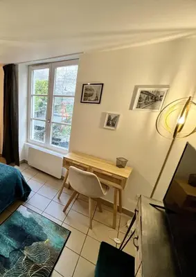 Coin salon dans l'établissement Montbel'appart Le Duplex avec Jardin et Terrasse