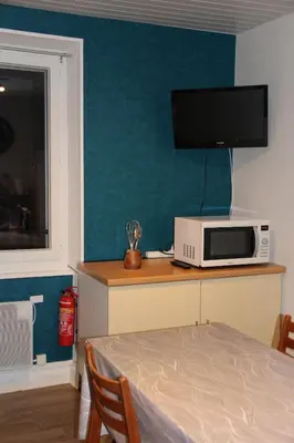 Cuisine ou kitchenette dans l'établissement Gérardmer en famille ou entre amis