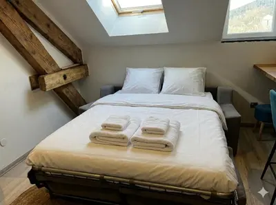Un ou plusieurs lits dans un hébergement de l'établissement Hyper centre 6 pers 2 chambres 2 salle de bain