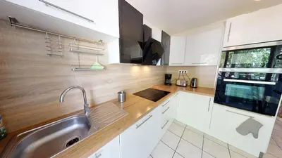 Cuisine ou kitchenette dans l'établissement Appartement F4 refait proche université