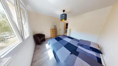 Un ou plusieurs lits dans un hébergement de l'établissement Appartement F4 refait proche université