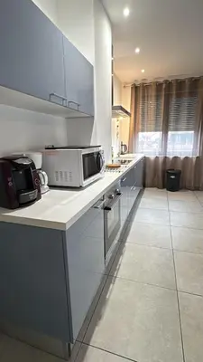 Cuisine ou kitchenette dans l'établissement Colmar Gîte des Cotonnades